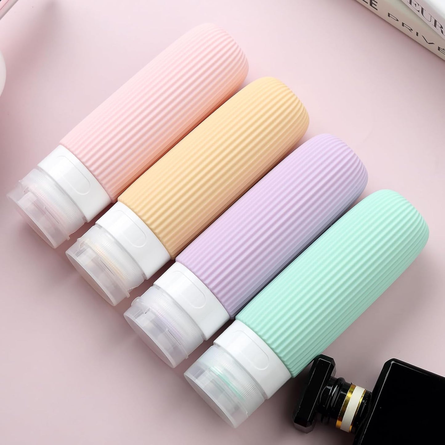 Travel Bottles for Toiletries, Tsa Approved 3oz Portable Travel Bottles, BPA Free Leak Proof Squeezable Silicone Travel Size Containers, Travel Accessories with Clear Toiletry Bag (4 Pack)